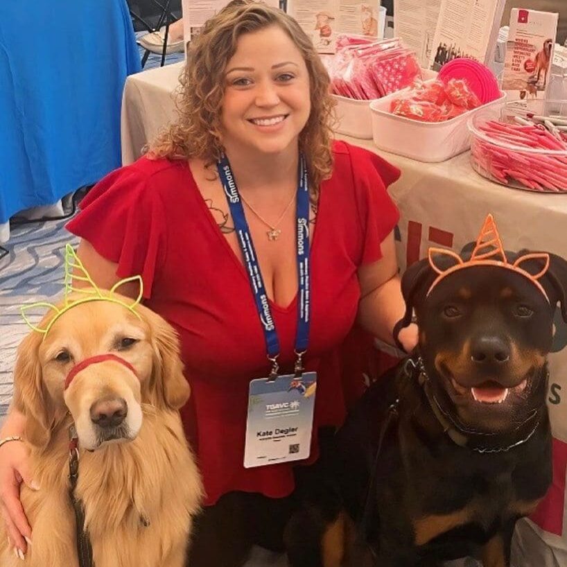 Lady With Two Dogs At Conference